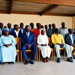 Democratic Stability**

"A diverse group of Chadian citizens participating in a town hall meeting, discussing community development, fully clothed, appropriate attire, safe for work, perfect anatomy, natural proportions, modest clothing, well-lit community center, professional photography, high quality, family-friendly."

**